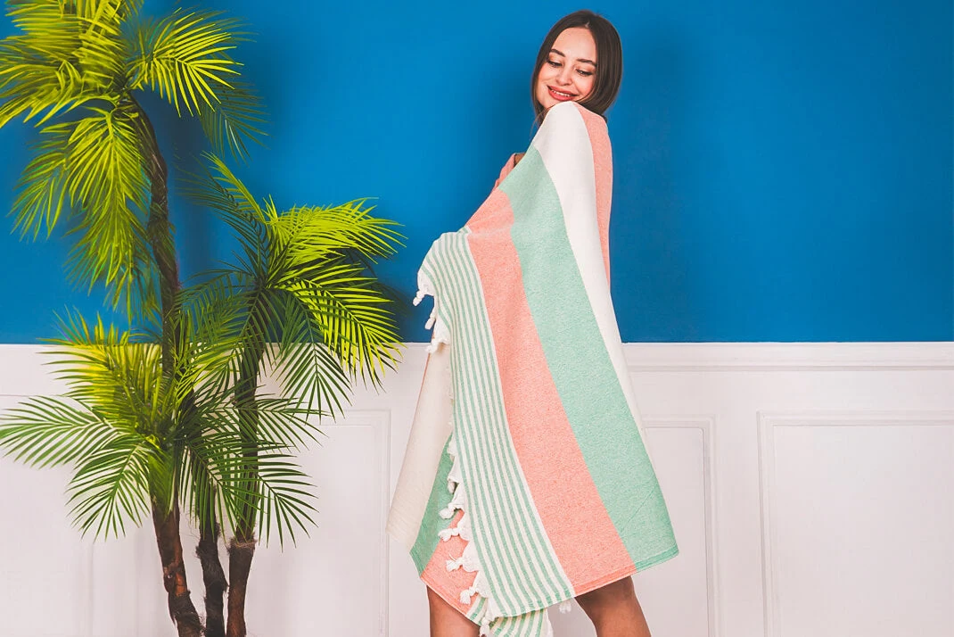 Chaka Bei striped beach towel styled by the pool